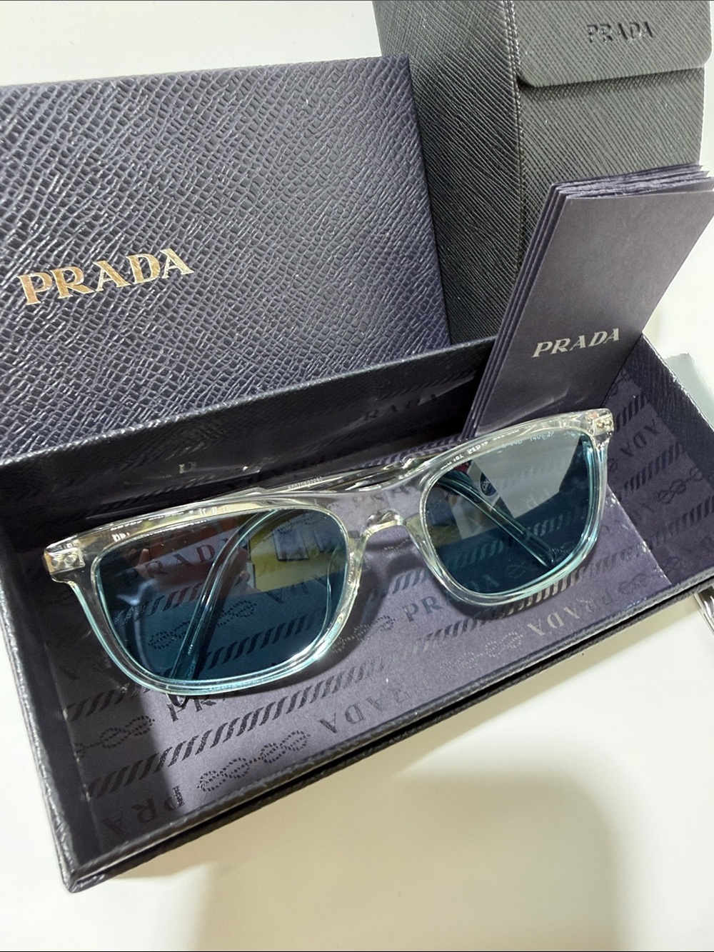 Prada Clear Frame Sunglasses with Blue Lenses - Picture 2 of 5